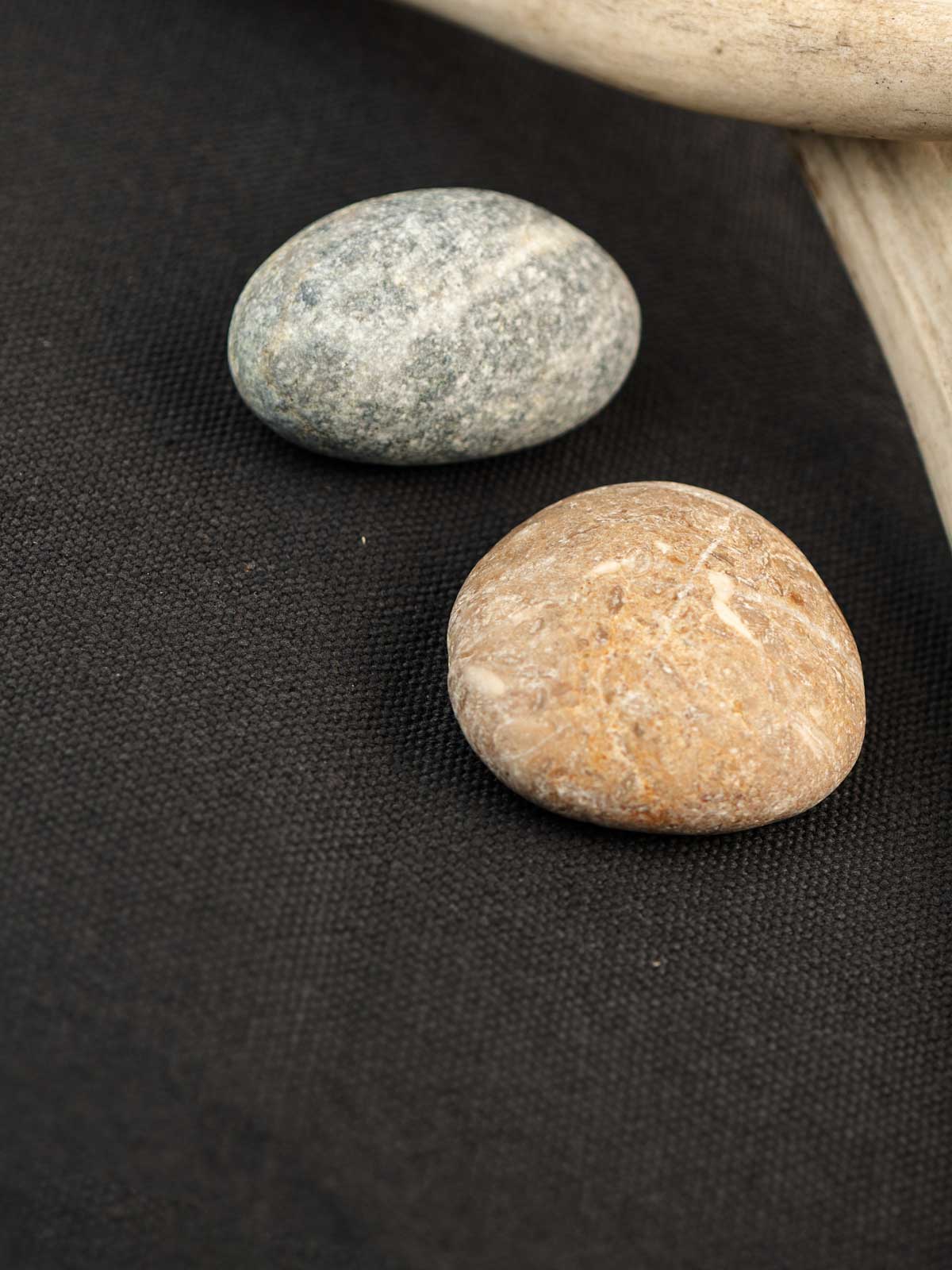 Two stones, one gray and one brown