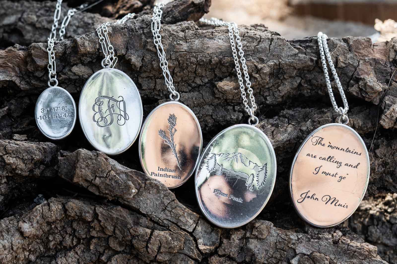 Sterling silver pendant necklaces engraved with personal messages and art