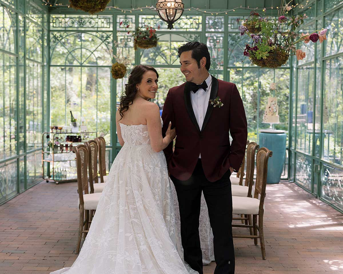 A wedding couple inside the solarium at Denver Botanic Gardens