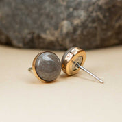 14k gold fill stud earrings set with a natural grey rock and custom engraved on the edge