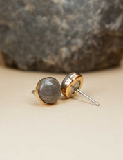 14k gold fill stud earrings set with a natural grey rock and custom engraved on the edge