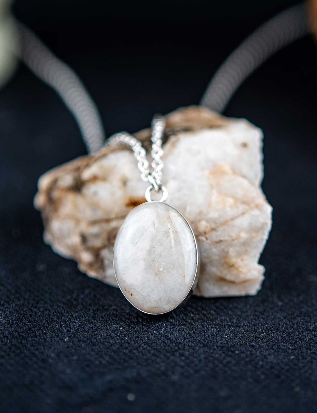 Small sterling silver pendant necklace with white natural stone