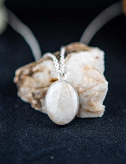 Small sterling silver pendant necklace with white natural stone