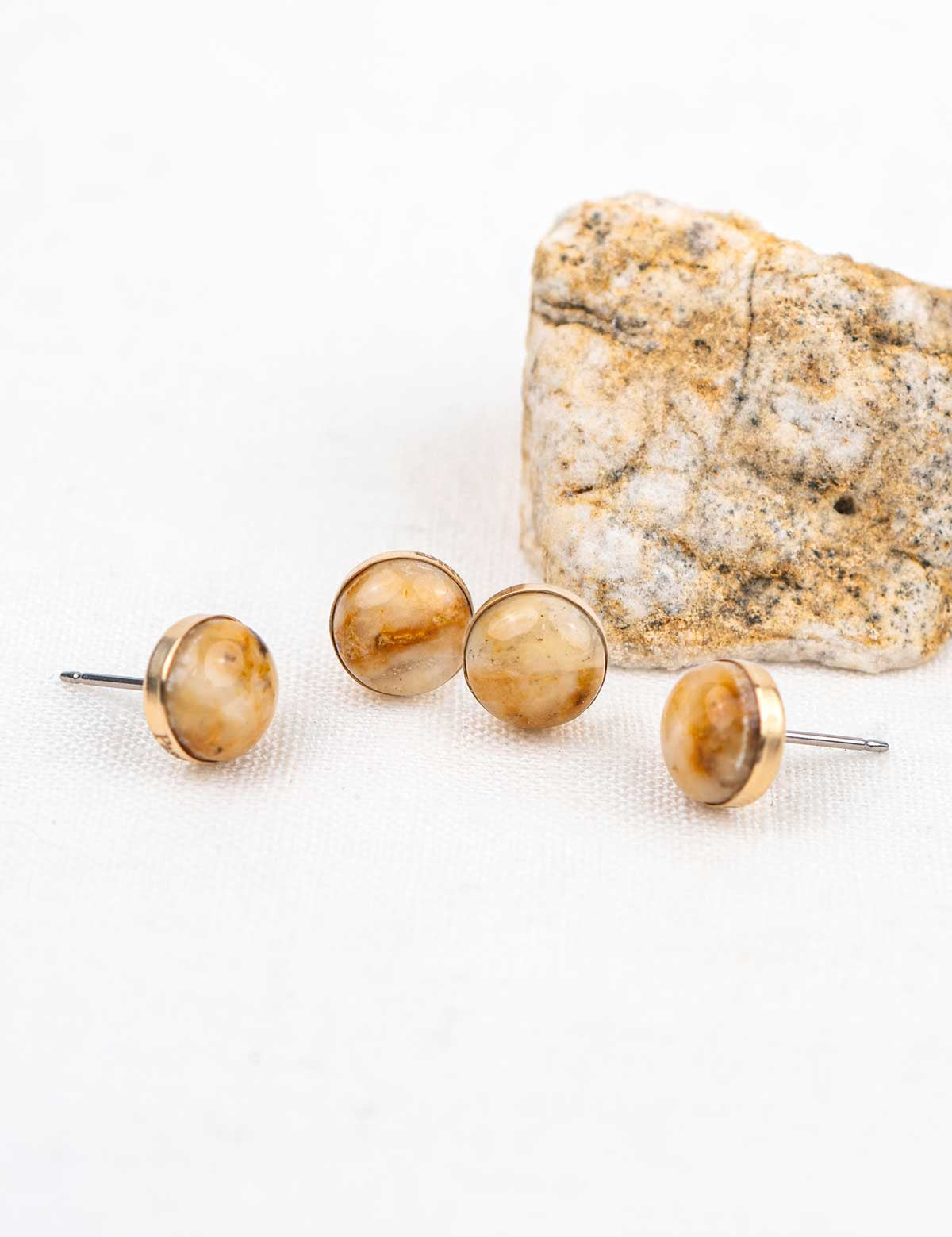 Set of matching stone stud earrings set in 14k gold fill with the rock they were made from