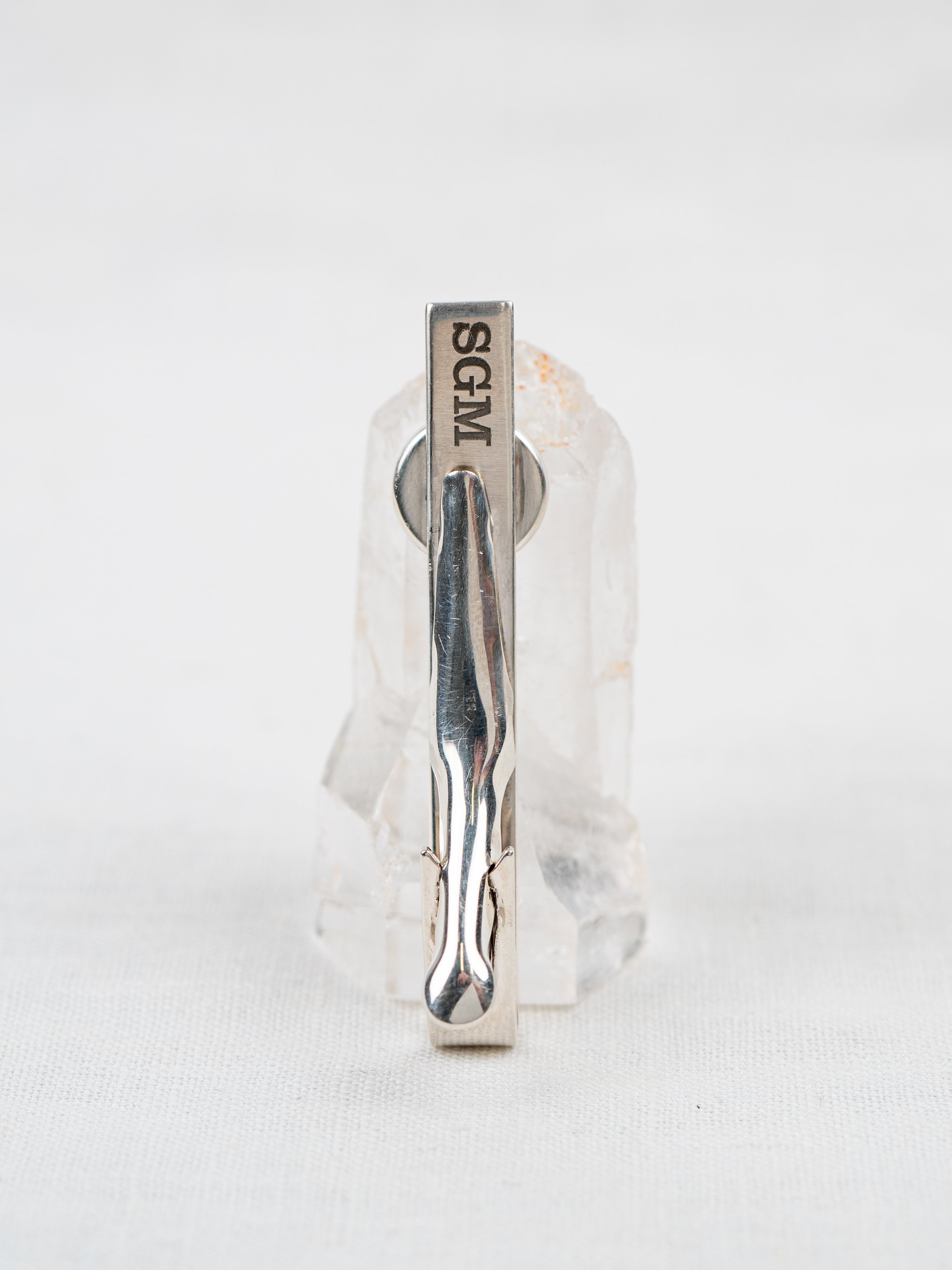 Sterling silver tie clip with initials engraved on the back