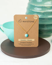 A small round pendant necklace made from natural Amazonite set in 14k gold fill