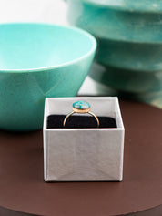 Gold fill ring with a round Amazonite stone in a white ring box