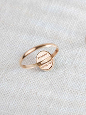 Gold fill ring with the engraved text "Forever My Mom" on the back of the oval stone setting