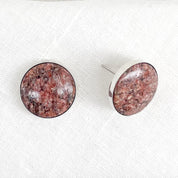 Large round stud earrings set in sterling silver made with natural red sandstone from Colorado