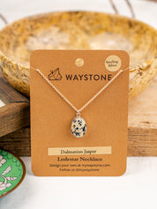 12x16 mm oval-shaped Dalmatian Jasper, polished to a shine and set in sterling silver