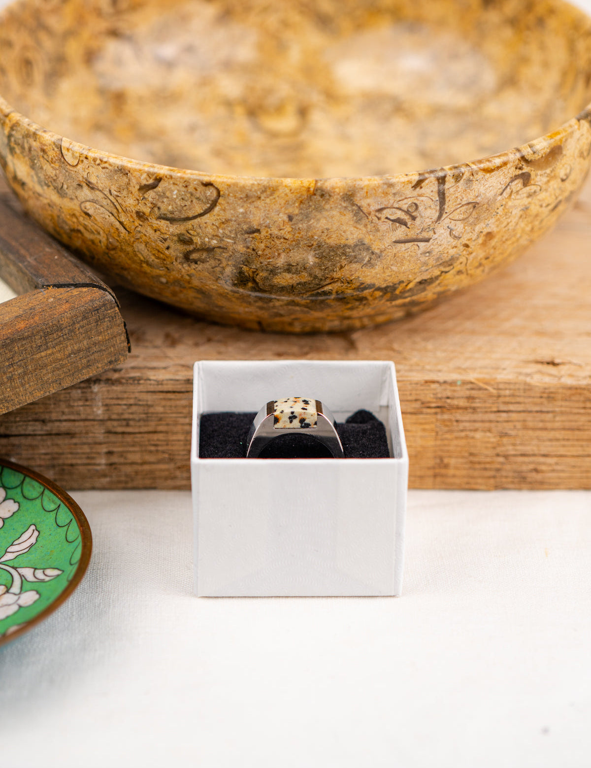 Rectangle-shaped Dalmatian Jasper, polished to a shine and set in stainless steel ring