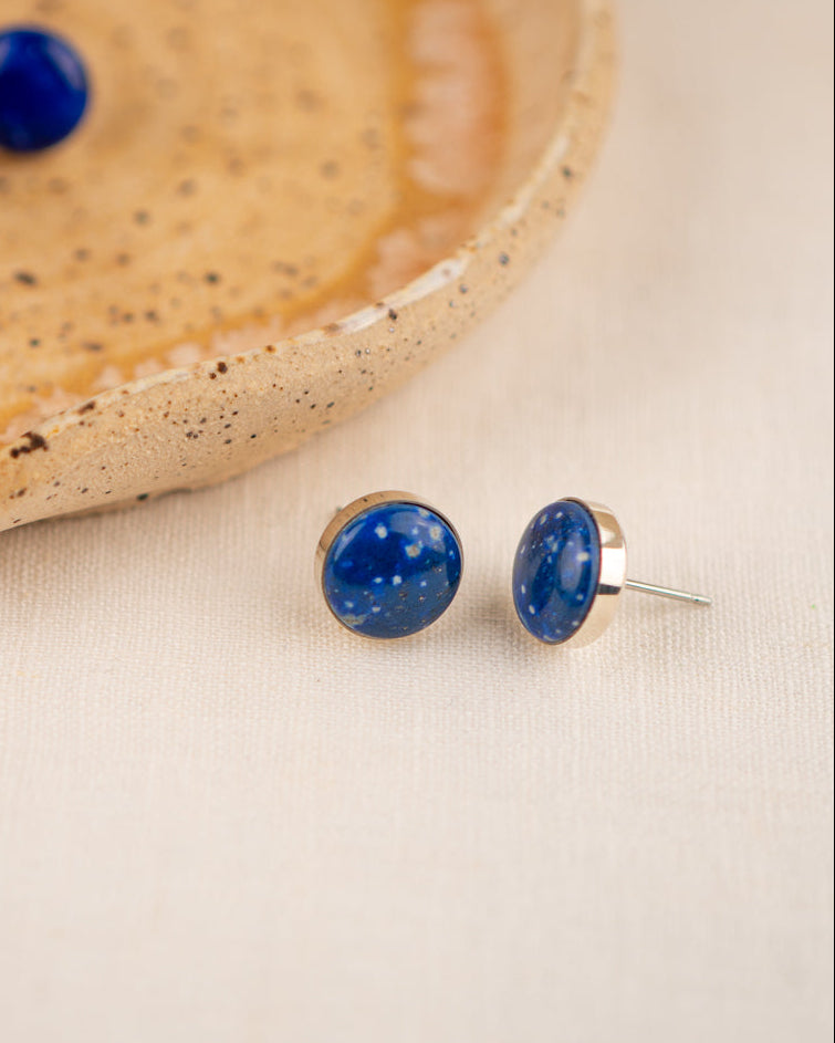 White-flecked lapis lazuli stud earrings with sterling silver settings