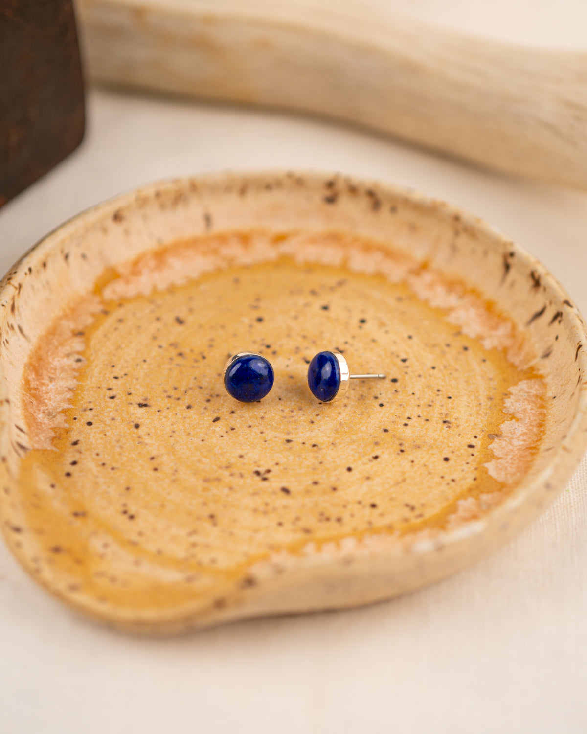 Blue lapis lazuli stud earrings set in sterling silver