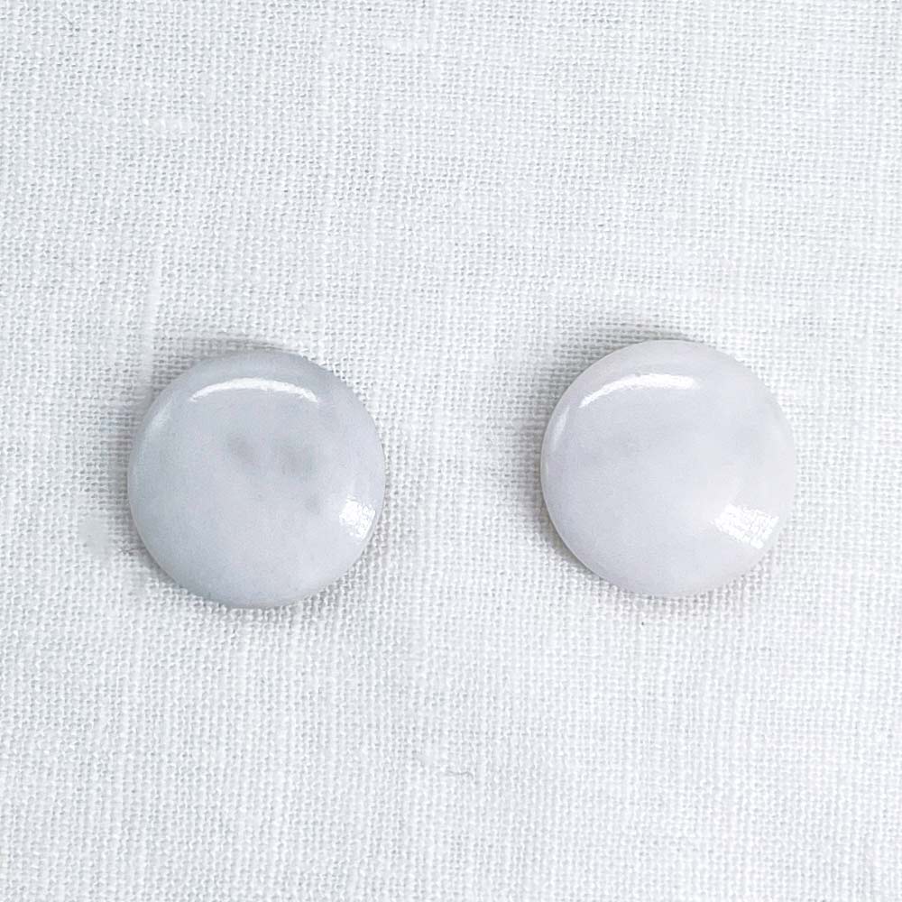 Front view with a pair of 16mm round white marble cufflinks
