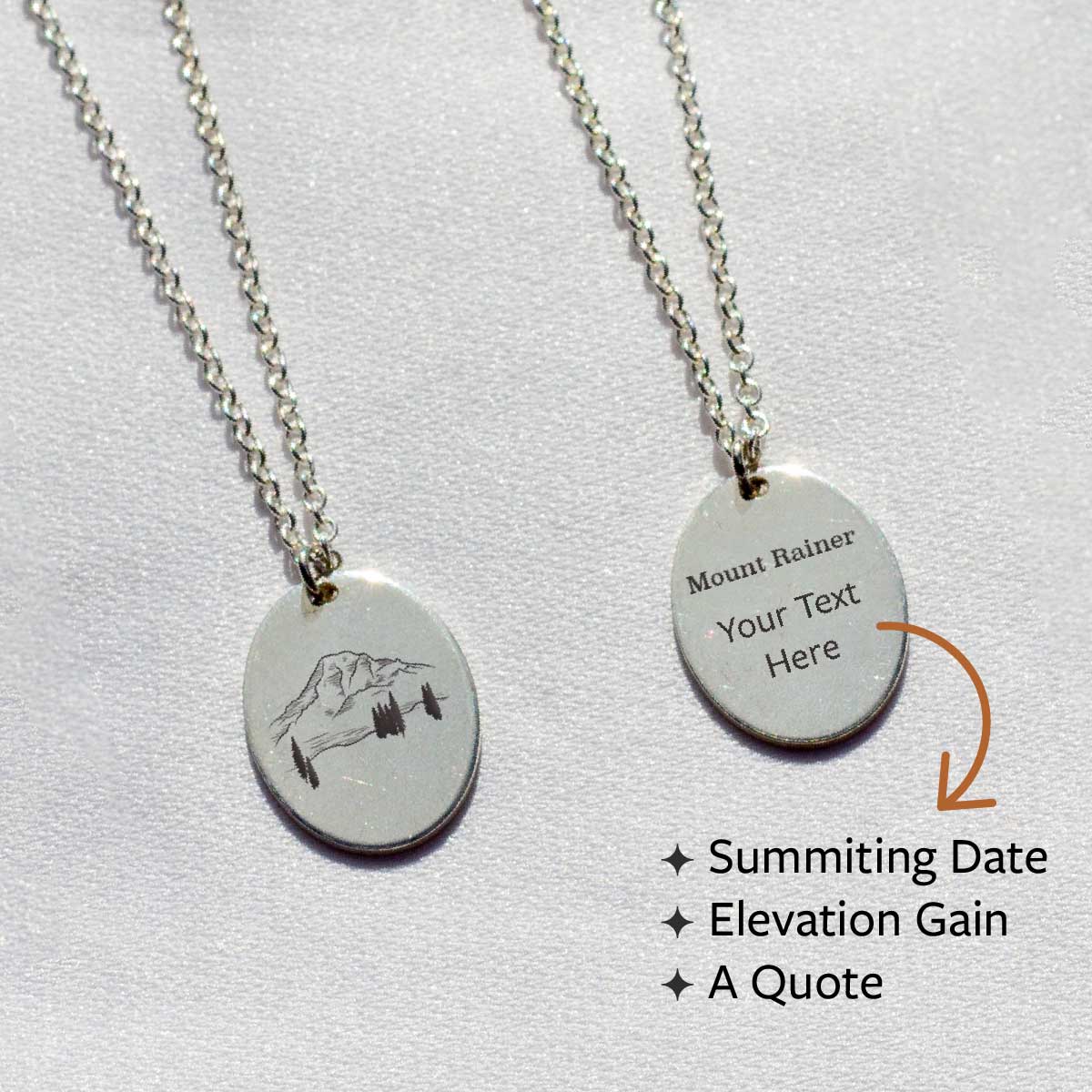 The front and back of a voyager charm necklace with a mountain design. Customize your own engraving for the back. Engrave your name, a summit date, elevation gain, or a quote.