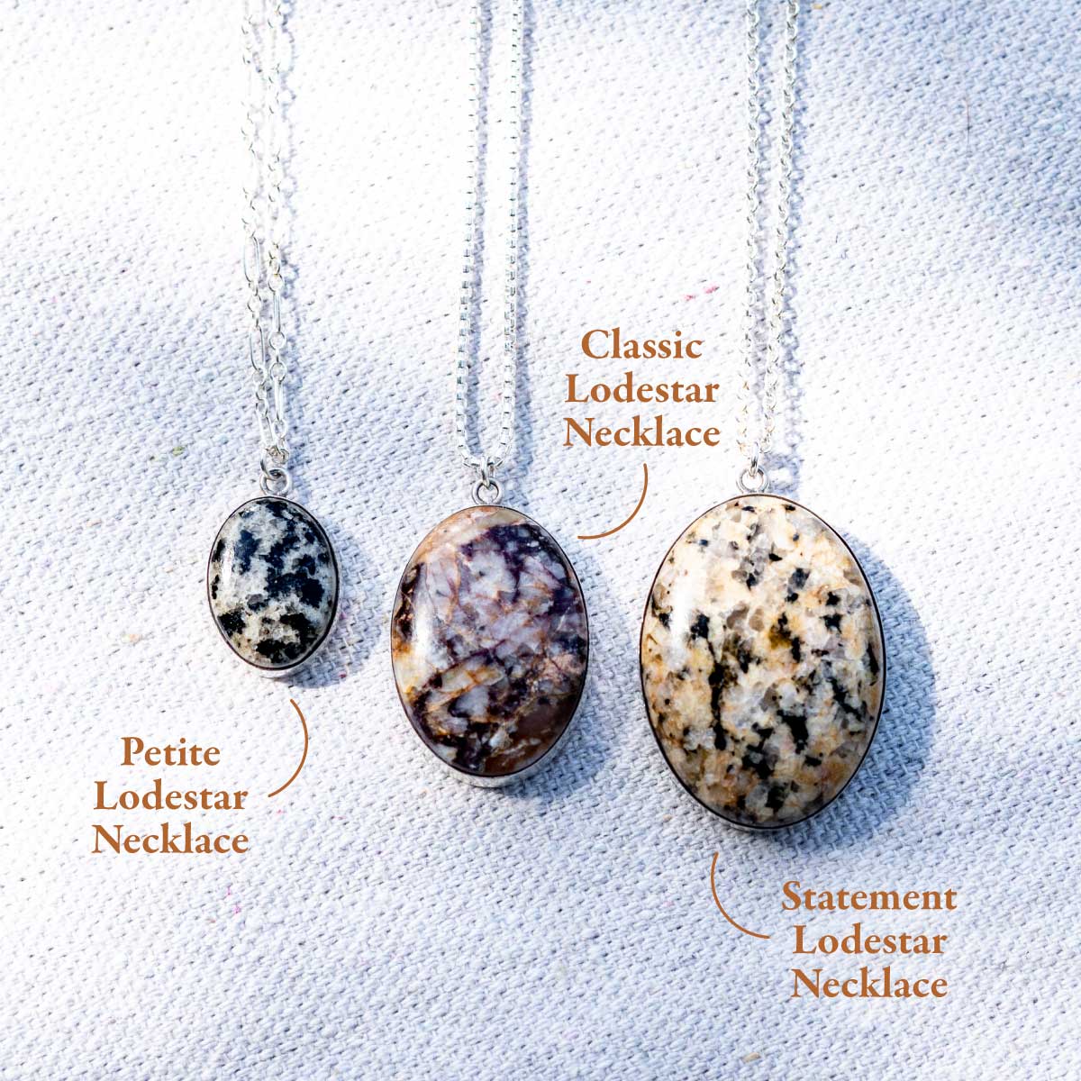 Three sizes of custom stone pendant necklaces: petite (small), classic (medium), and statement (large)