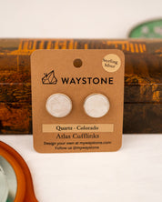 White colored milky quartz set into a sterling silver cufflinks on a Waystone branded card