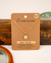 White colored milky quartz set into 14K Gold Fill pendant on a Waystone branded card