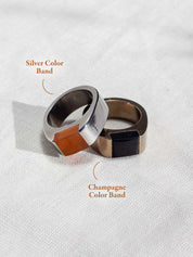 Two stainless steel signet rings, one in silver color and one in champagne color