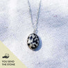 Black and white stone pendant necklace on long/short sterling silver chain. Text on the image reads, "You send the stone."