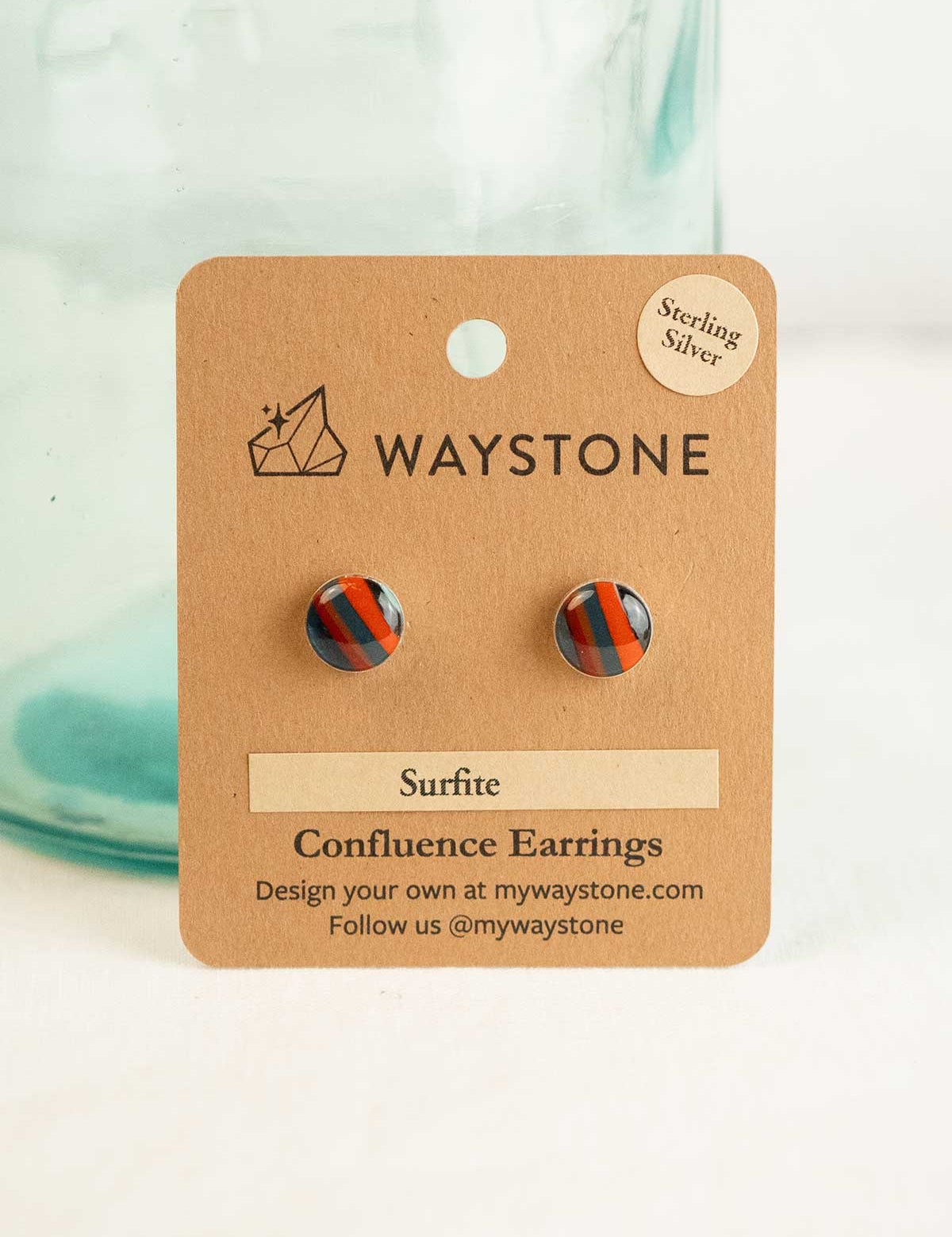 10mm round upcycled surfite, polished to a shine and set in sterling silver studs 