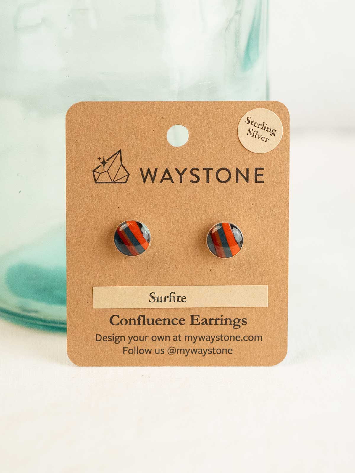 10mm round upcycled surfite, polished to a shine and set in sterling silver studs 