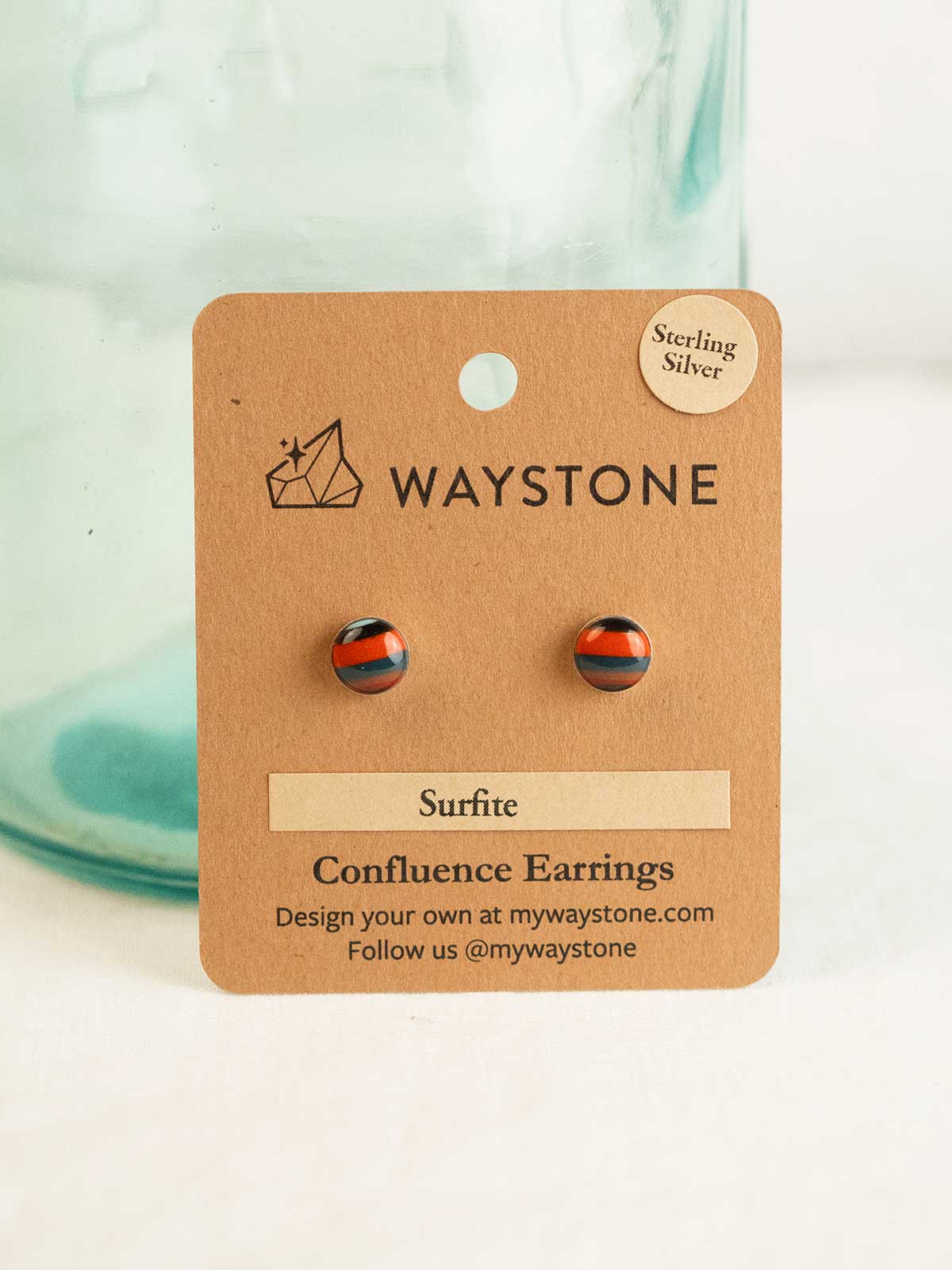 8mm round upcycled surfite, polished to a shine and set in sterling silver studs 