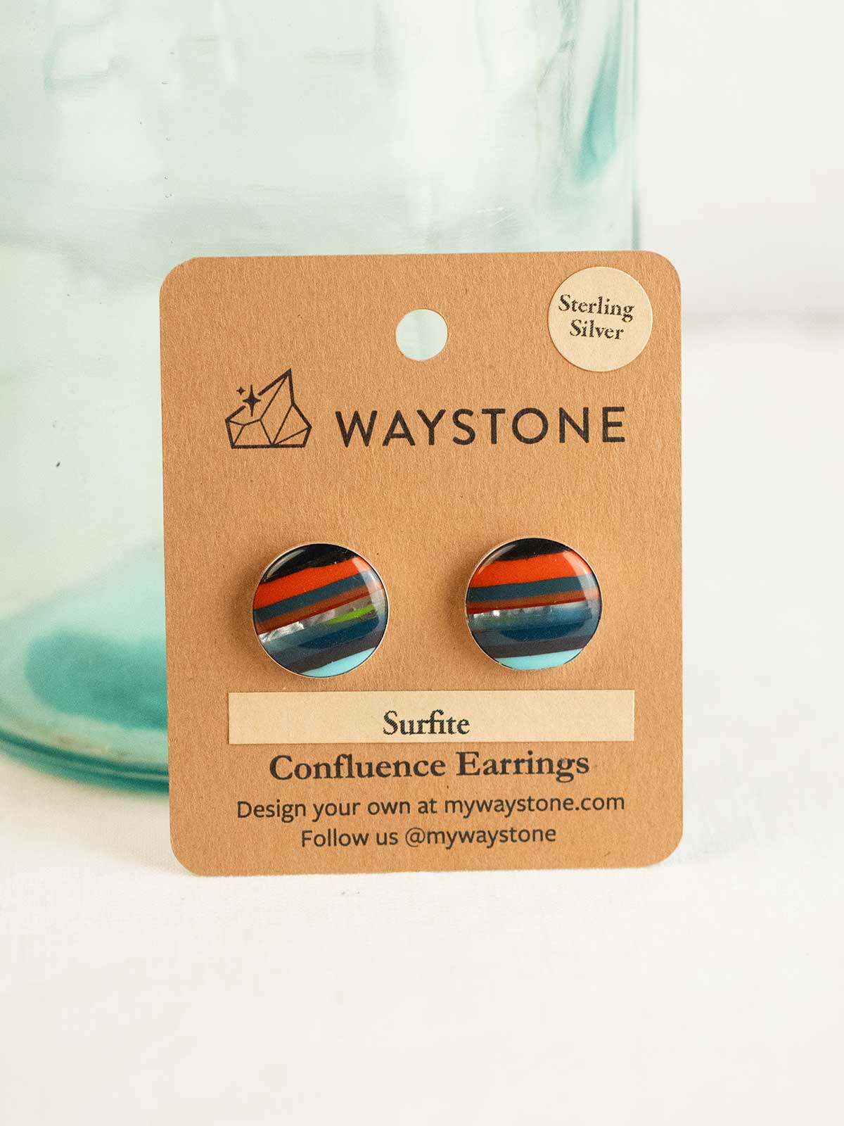 16 mm round upcycled surfite, polished to a shine and set in sterling silver studs 