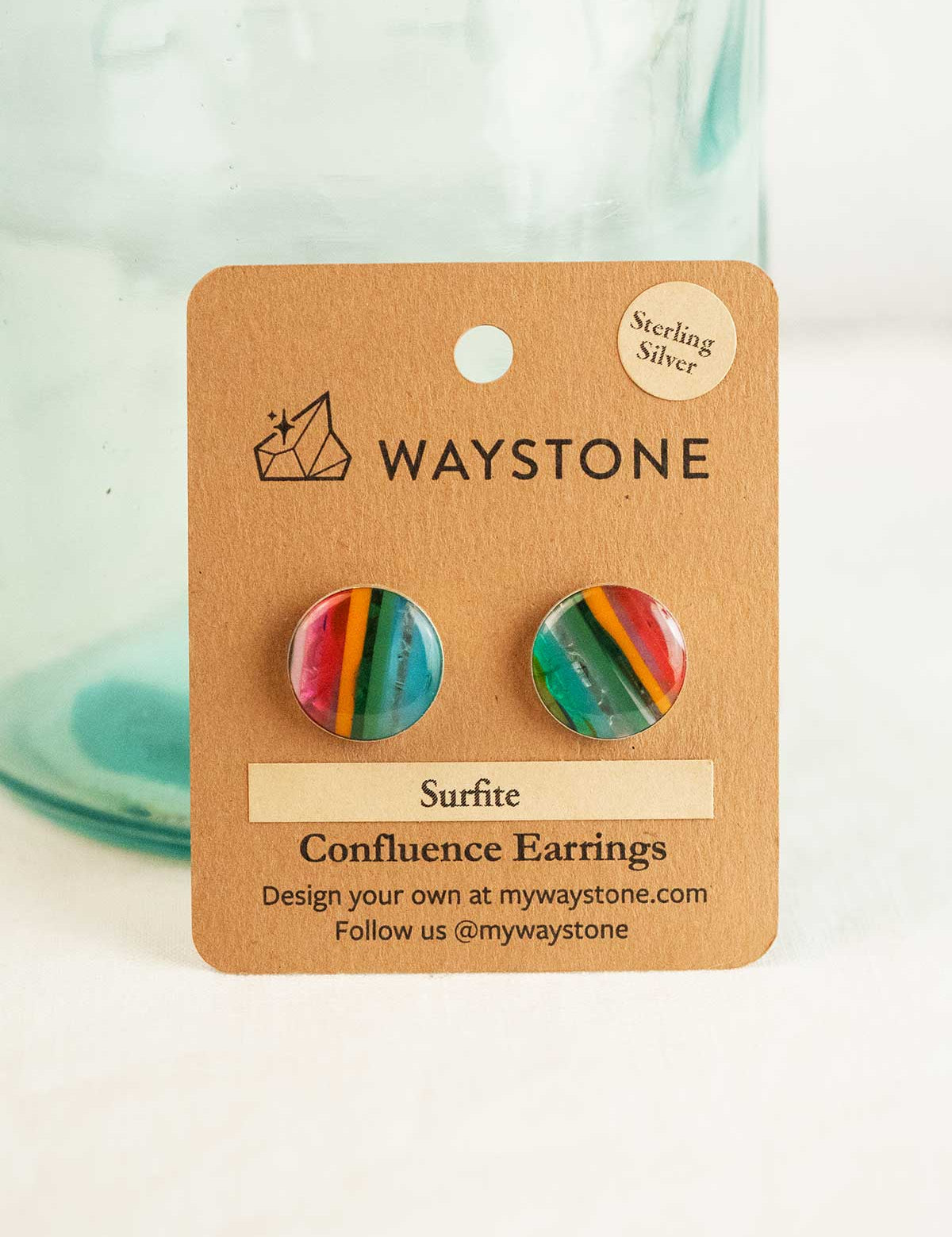 16 mm round upcycled surfite, polished to a shine and set in sterling silver studs 