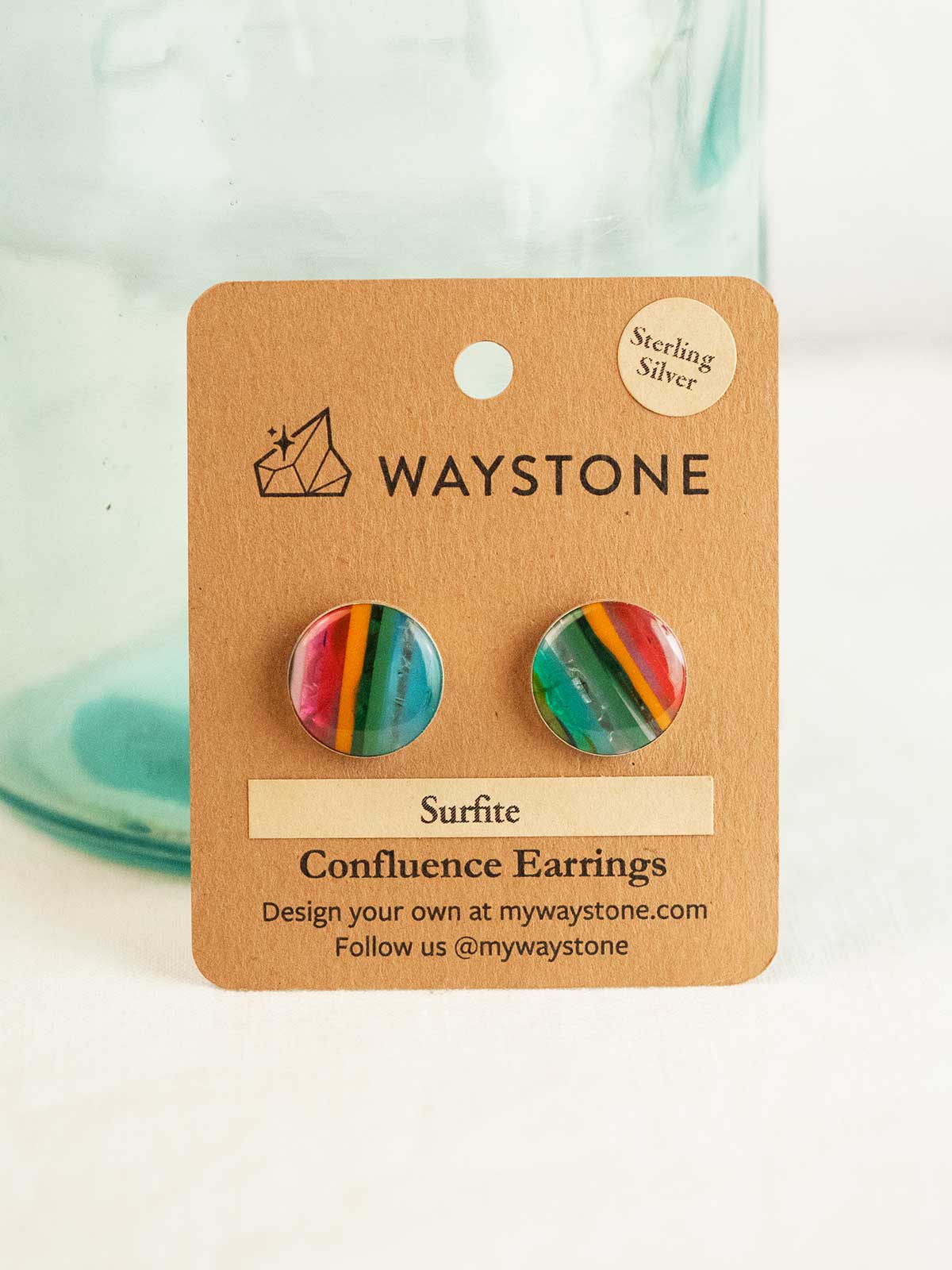 16 mm round upcycled surfite, polished to a shine and set in sterling silver studs 