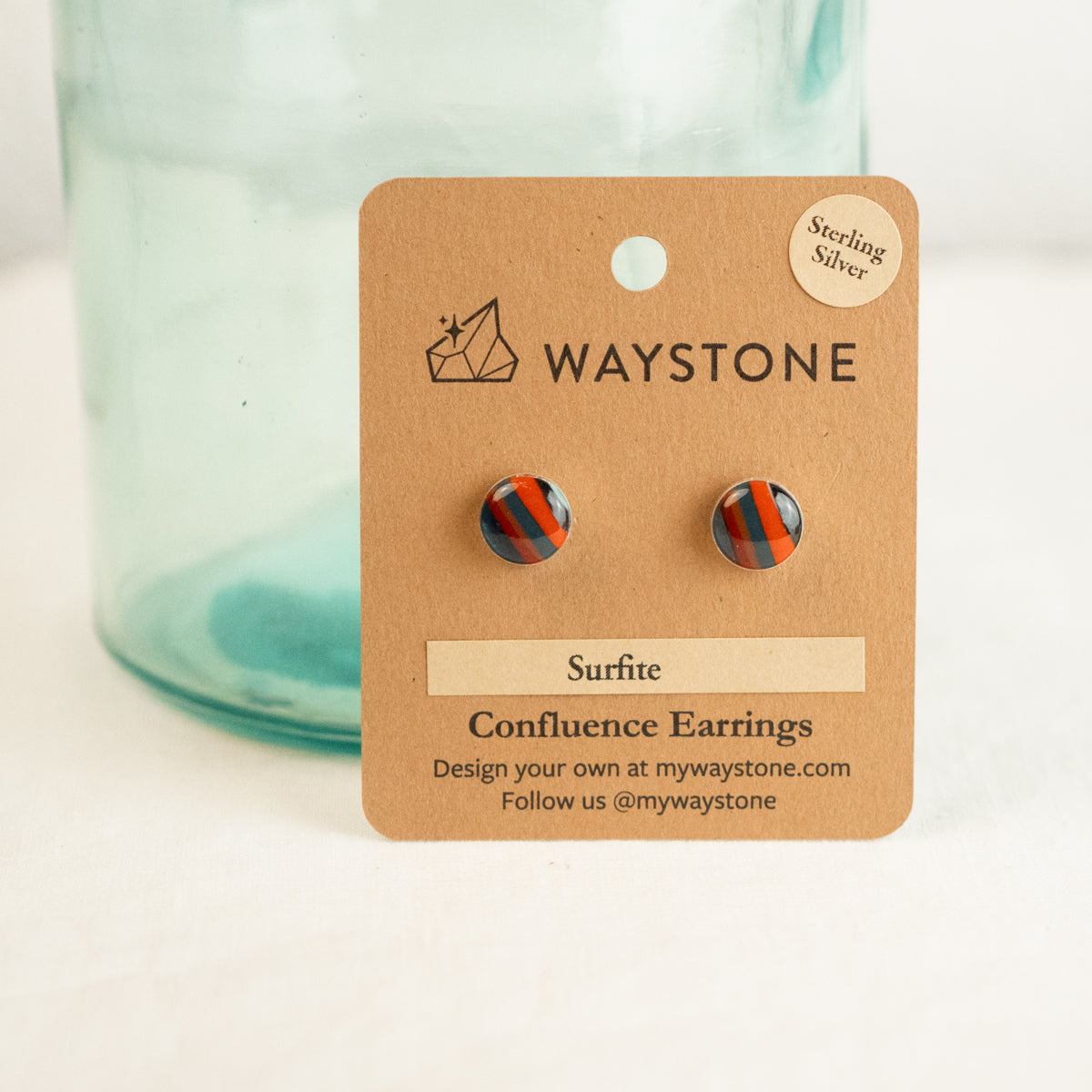 10mm round upcycled surfite, polished to a shine and set in sterling silver studs 