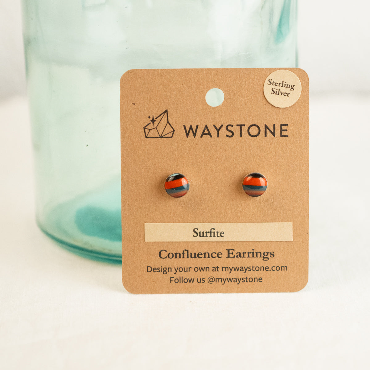 8mm round upcycled surfite, polished to a shine and set in sterling silver studs 