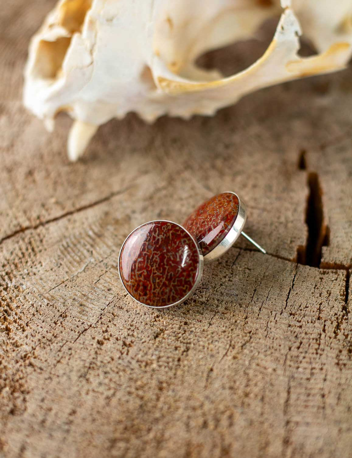 Red dinosaur gembone set as large stud earrings