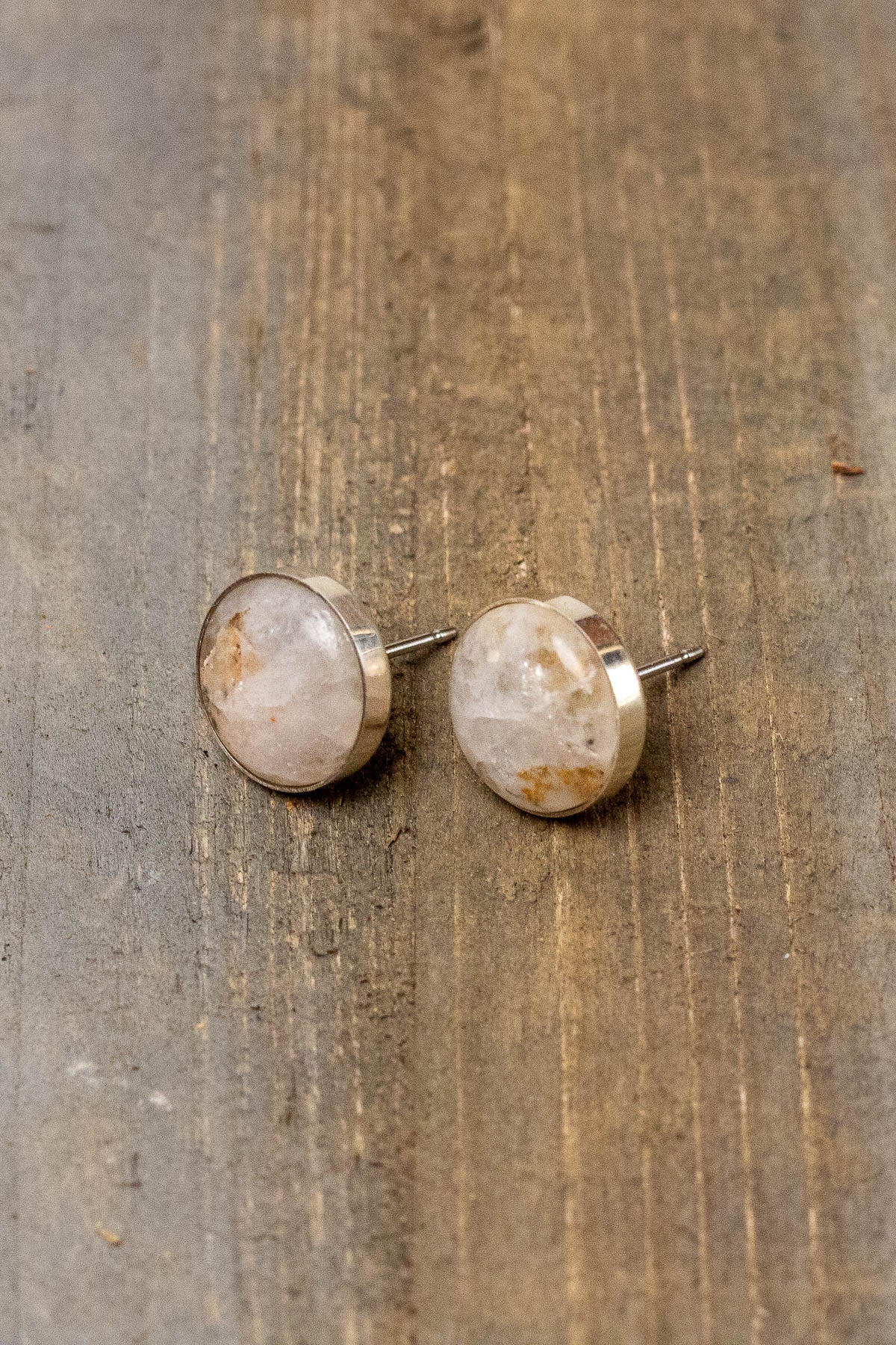 Pair of quartz stone stud earrings with a round sterling silver setting