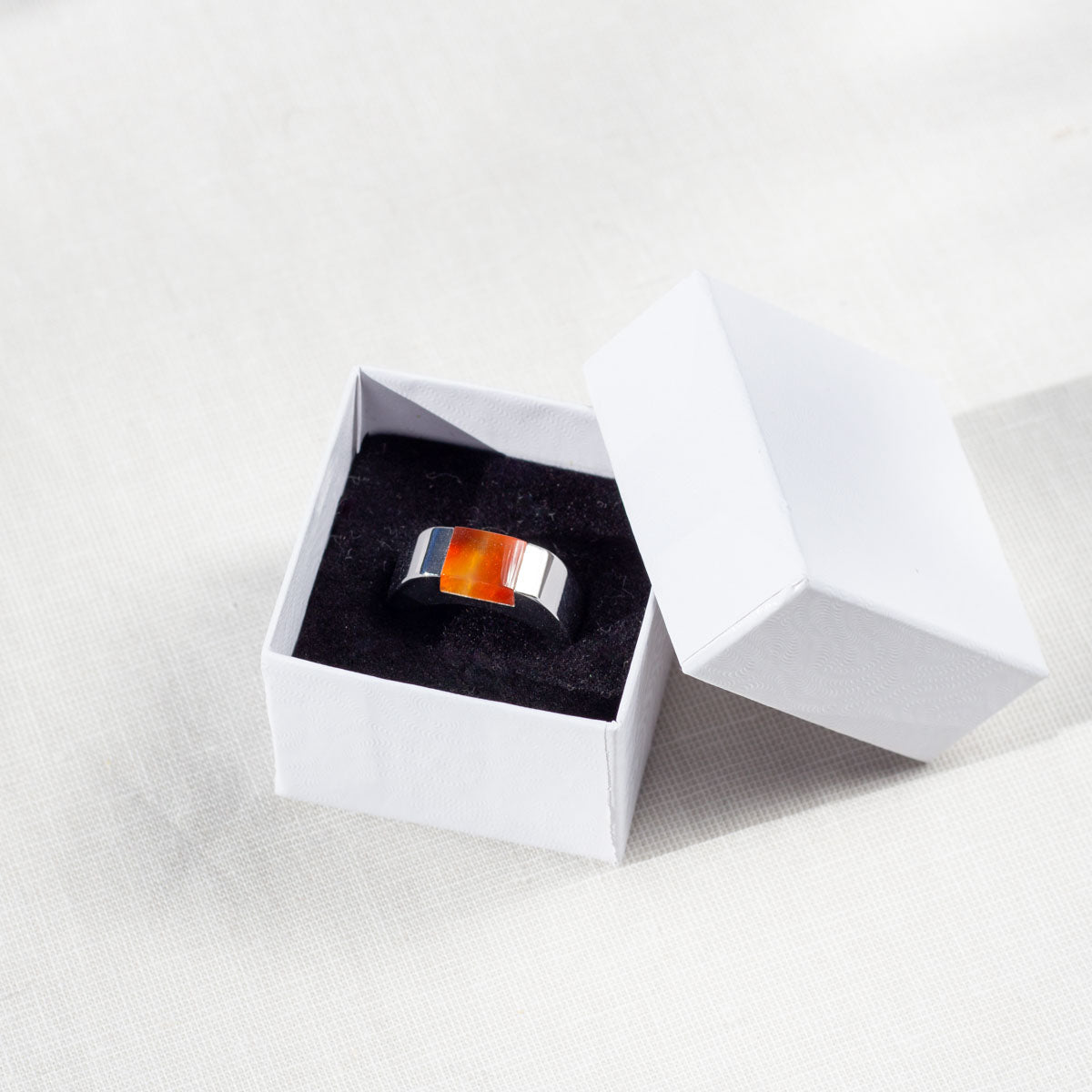 Customizable stone ring with personalized engraving in white gift box