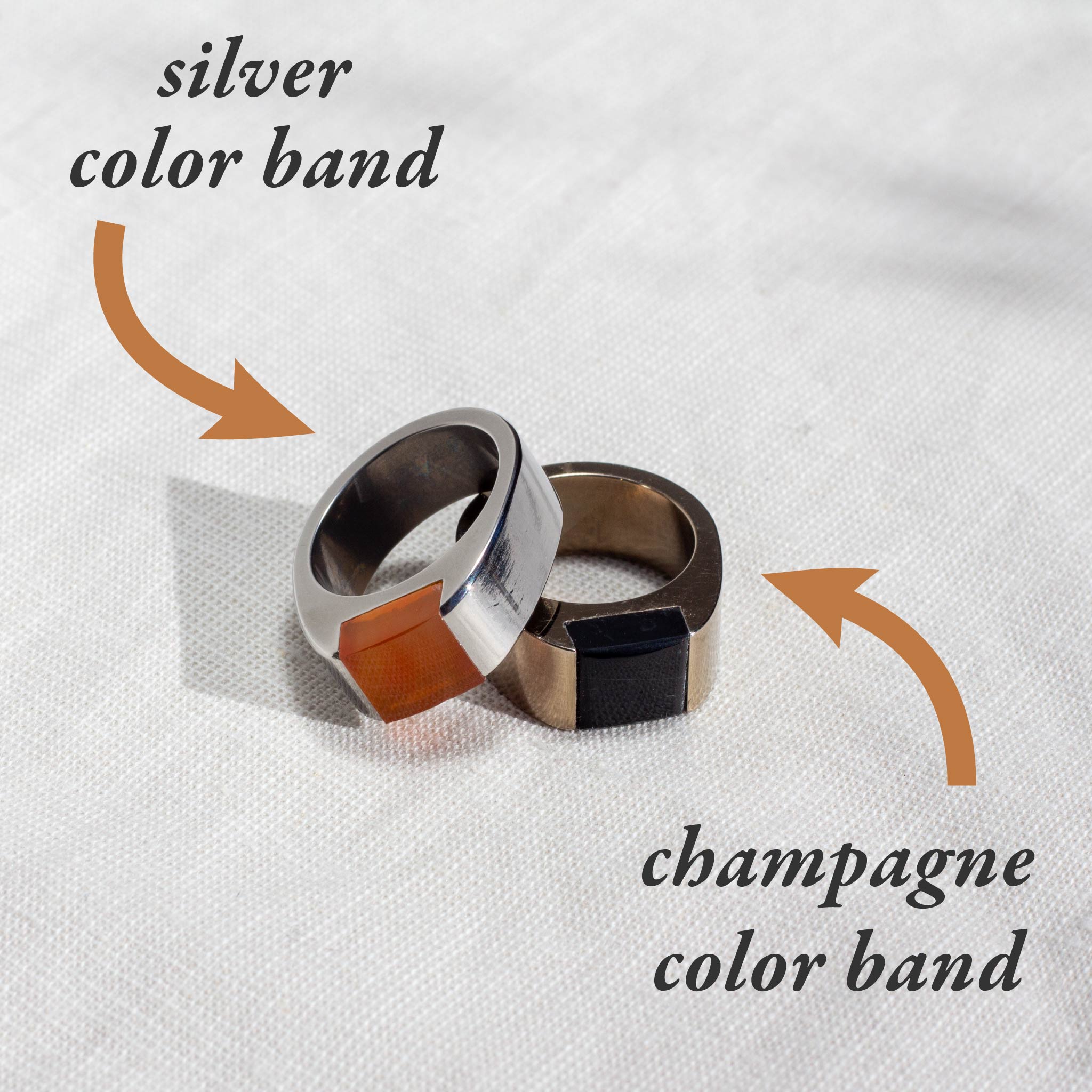 Two signet rings, one in silver color and one in champagne color